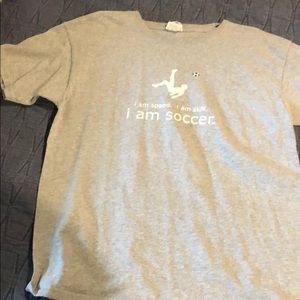 Grey short sleeve shirt with writing